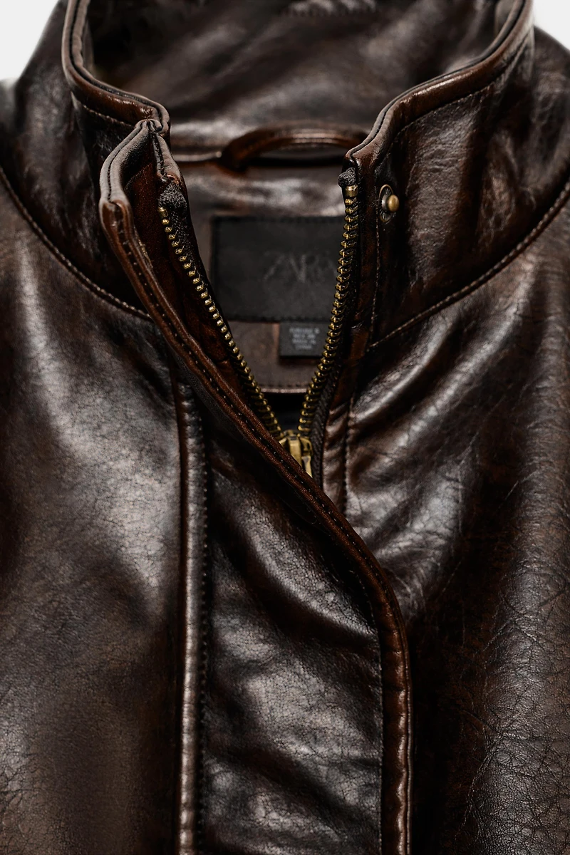 FAUX LEATHER JACKET WITH STRAPS
