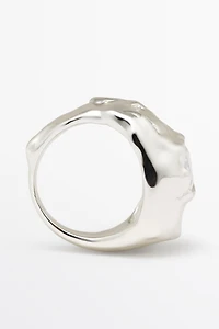 Melted effect shimmery ring