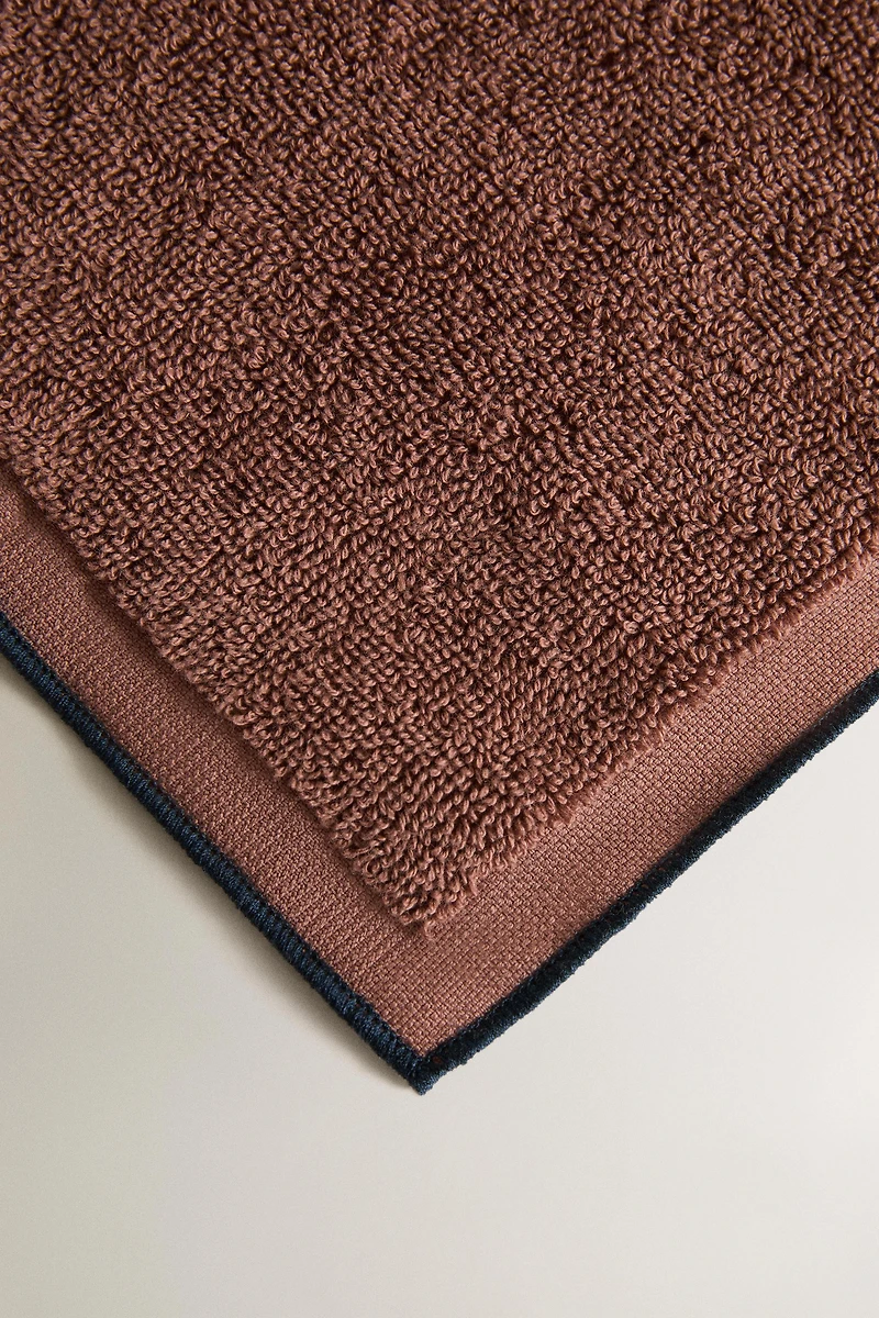 COTTON OVERLOCK BATH TOWEL