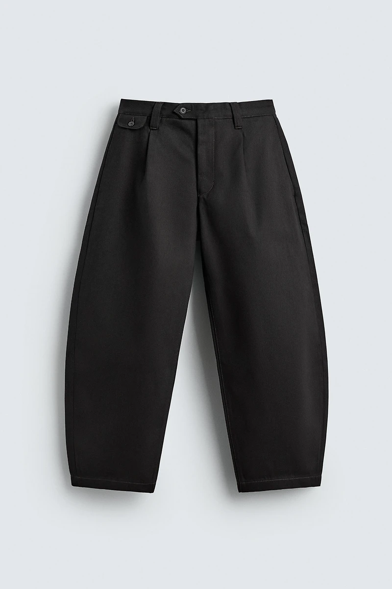 PLEATED BALLOON FIT JEANS