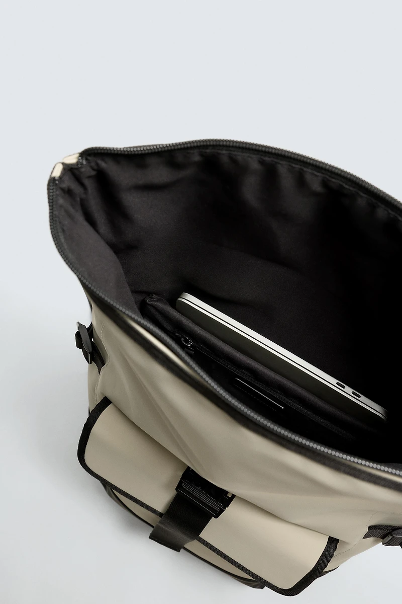 RUBBERIZED FLAP BACKPACK