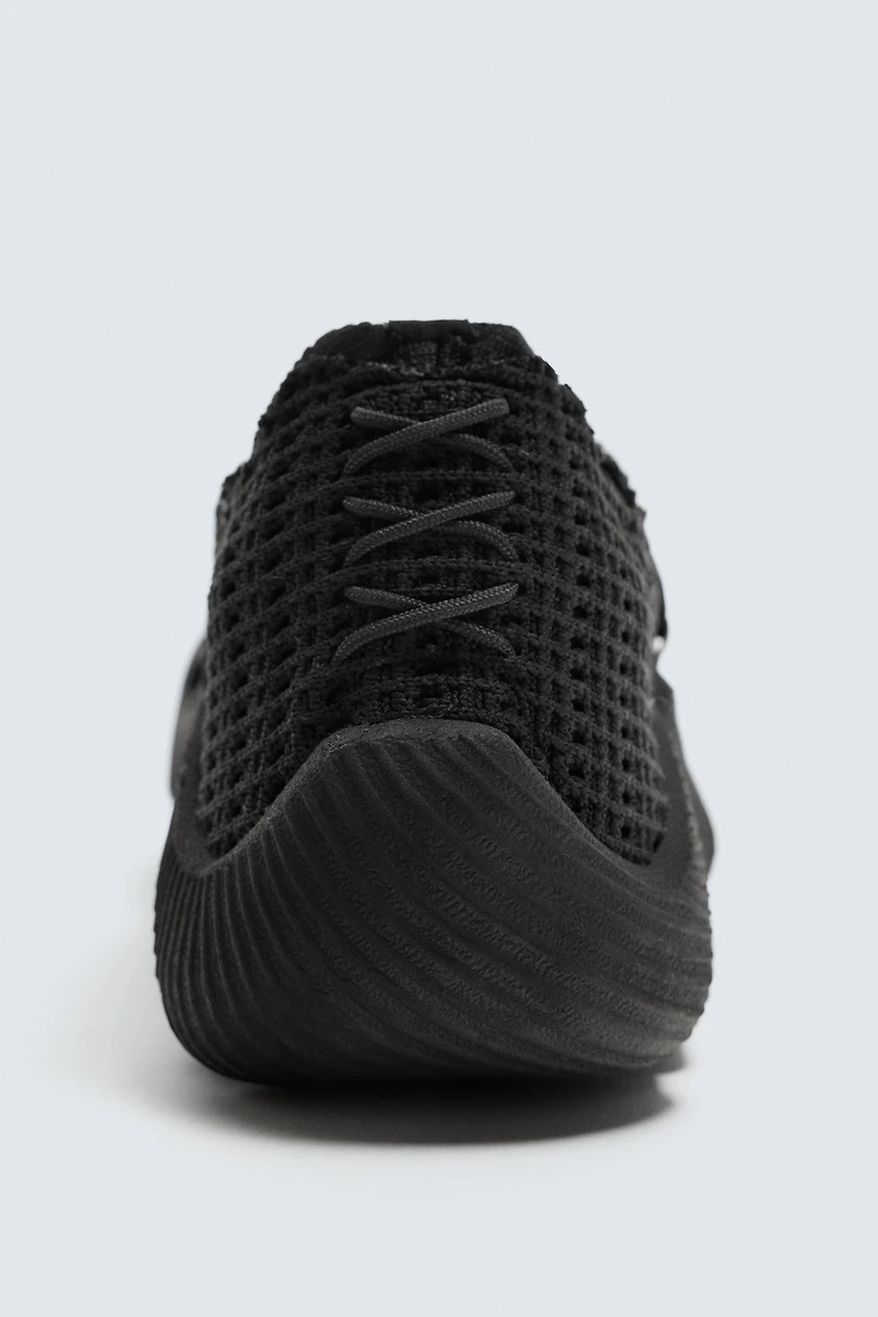 IRREGULAR SOLE SNEAKERS