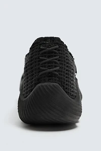 IRREGULAR SOLE SNEAKERS