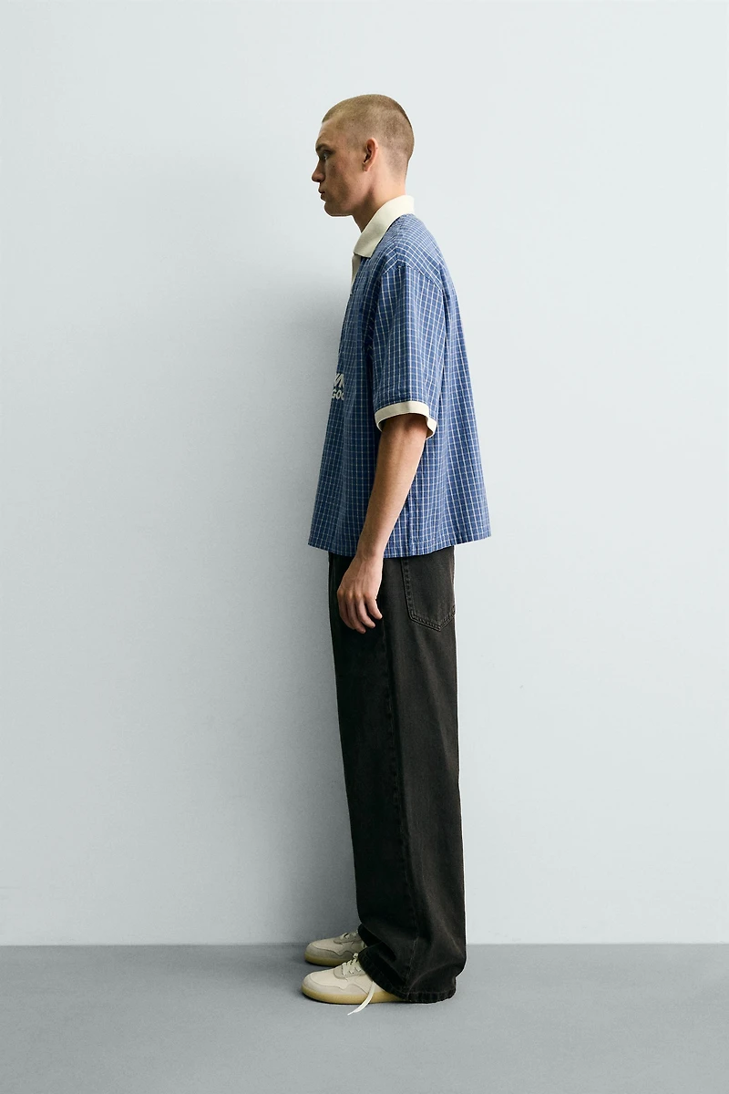 PRINTED TEXT CROPPED POLO SHIRT