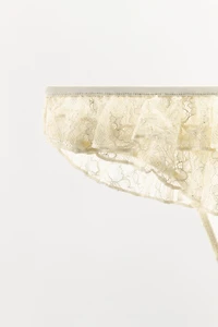 TANGA EN DENTELLE À VOLANTS