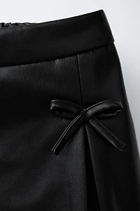 FAUX LEATHER TIED SKORT