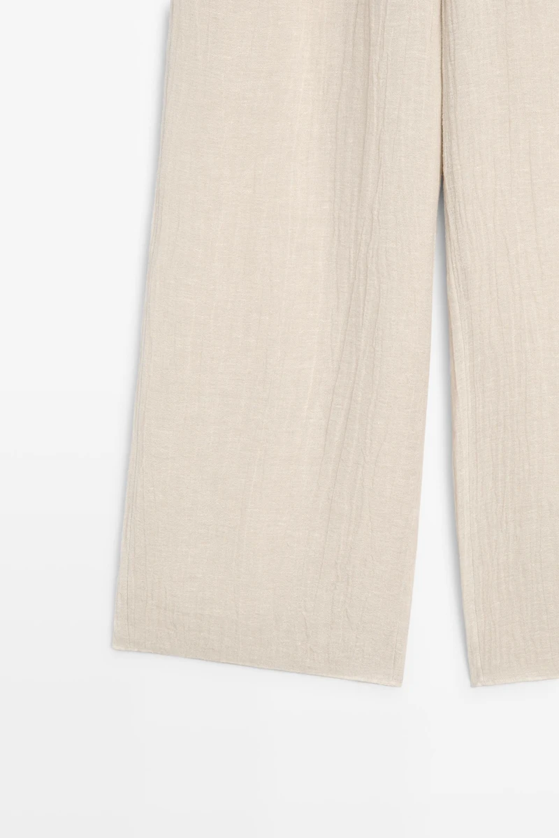 Total look flowing waffle-knit linen blend trousers