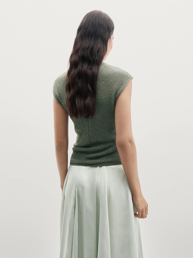 Sleeveless knit top with openwork details