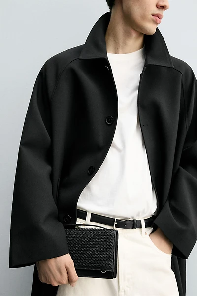 PORTEFEUILLE OVERSIZE TRESSÉ