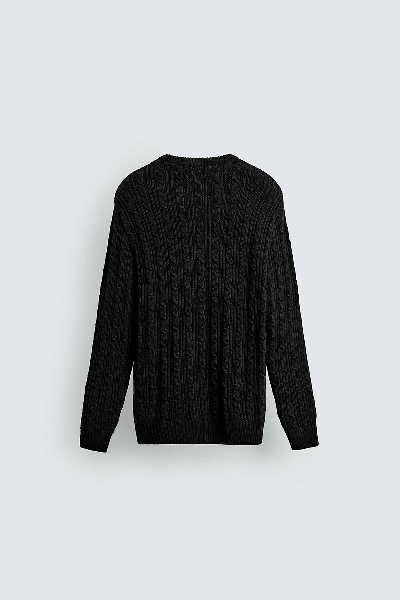 TEXTURED WOVEN SWEATER
