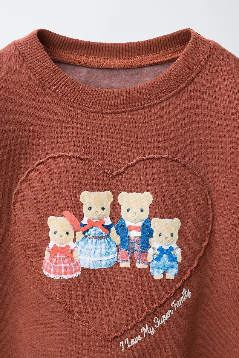 SWEAT AVEC PIÈCE CALICO CRITTERS ®
