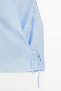 Top à encolure américaine avec nœud 100 % lin