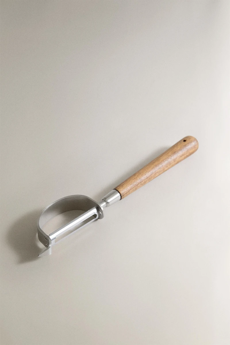 STEEL AND ACACIA PEELER