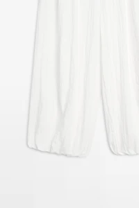 Flowing sarouel trousers with textured detail