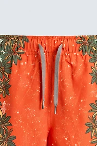 LONG FLORAL PRINT SWIM TRUNKS