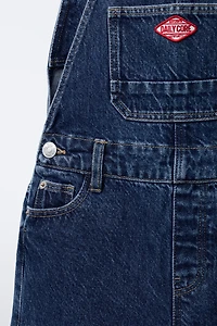 DENIM OVERALLS WITH LABEL