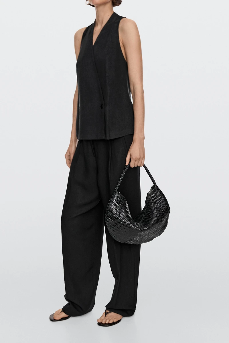 Sac demi-lune tressé cuir