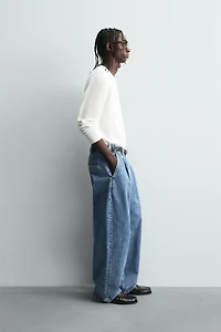 JEAN COUPE AMPLE À PLIS