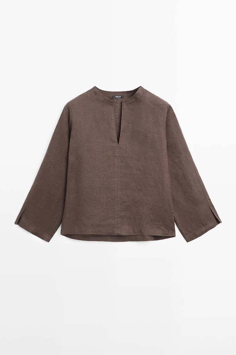100% linen blouse with topstitching detail