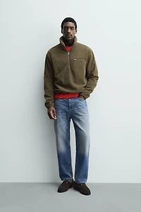 SWEAT POLAIRE COL ZIPPÉ