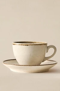 PORCELAIN TEACUP WITH ANTIQUE FINISH RIM