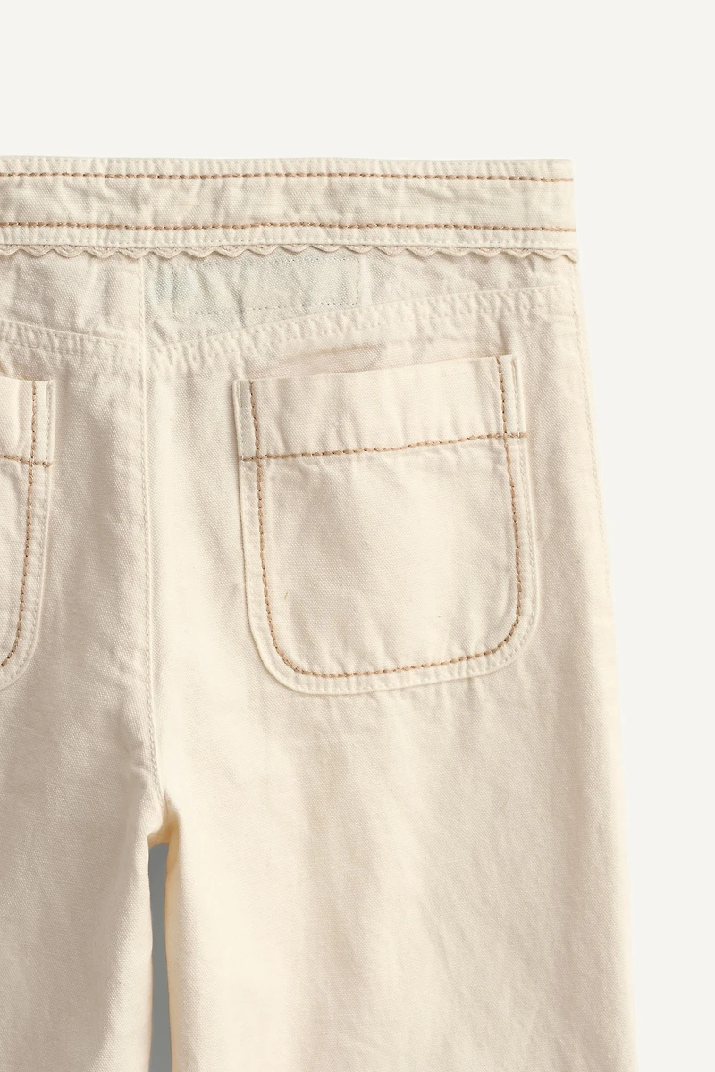 LIMITED EDITION FLARE PANTS WITH TOPSTITCHING