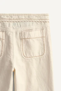 LIMITED EDITION FLARE PANTS WITH TOPSTITCHING