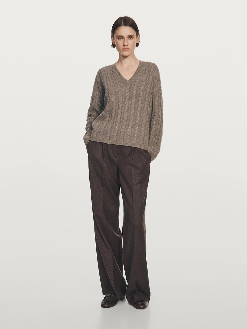 Cable-knit V-neck sweater