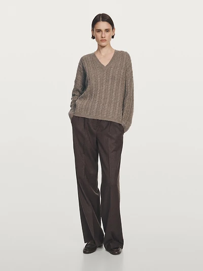 Cable-knit V-neck sweater