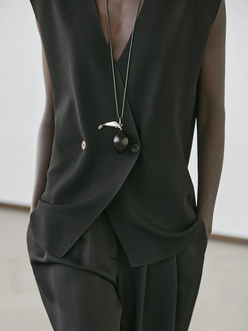 Long double-breasted vest