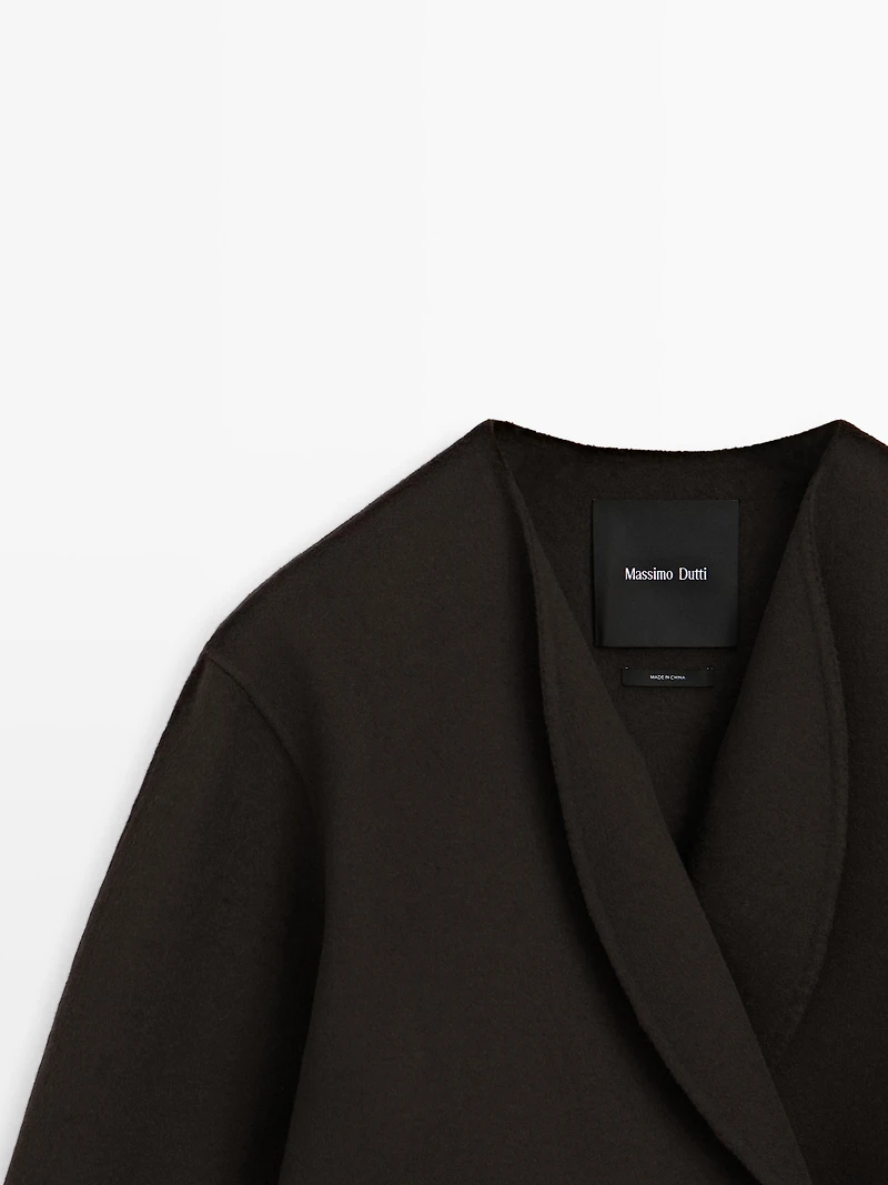 Short coat with rounded lapels