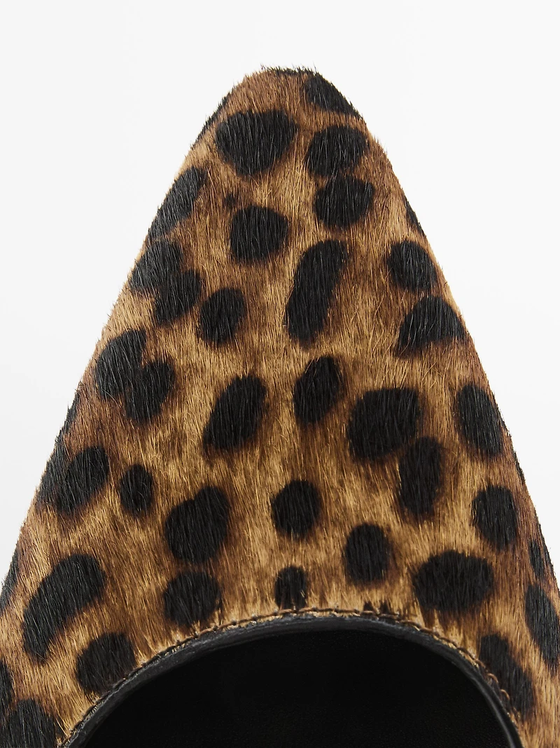 Heeled leopard print shoes