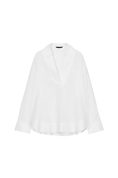 BLOUSE EN LIN À COL POLO