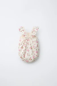 FLORAL EYELET ROMPER