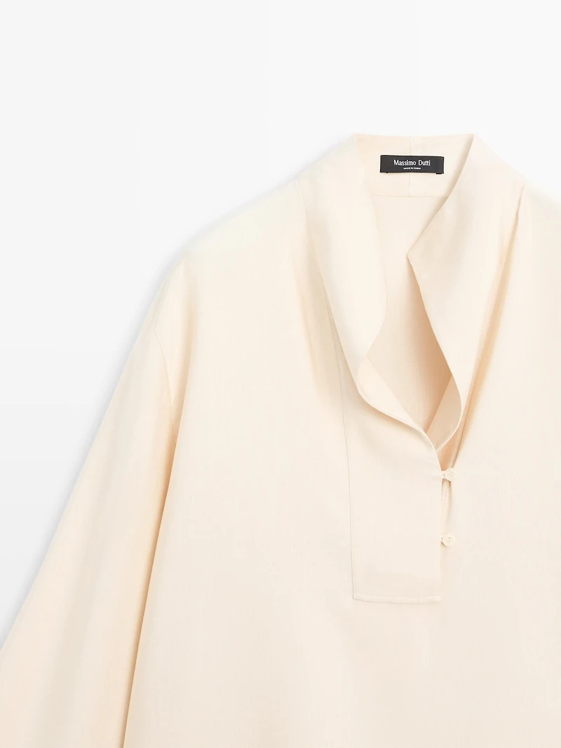 Flowing blouse with bib detail