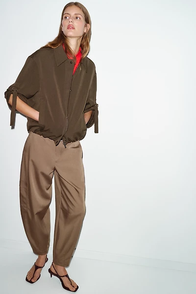 TABBED SLEEVE BOMBER JACKET