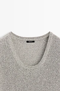 Short sleeve knit sweater with thread detail