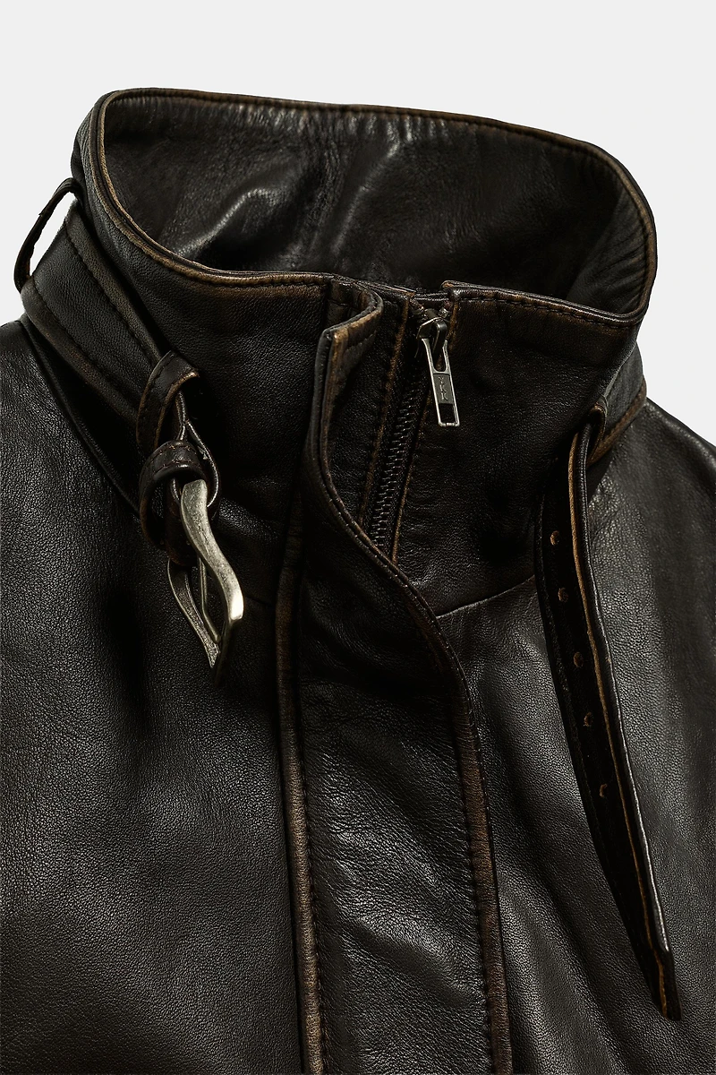 BLOUSON EN CUIR 100% USÉ