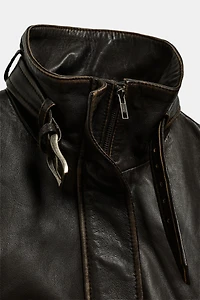 BLOUSON EN CUIR 100% USÉ