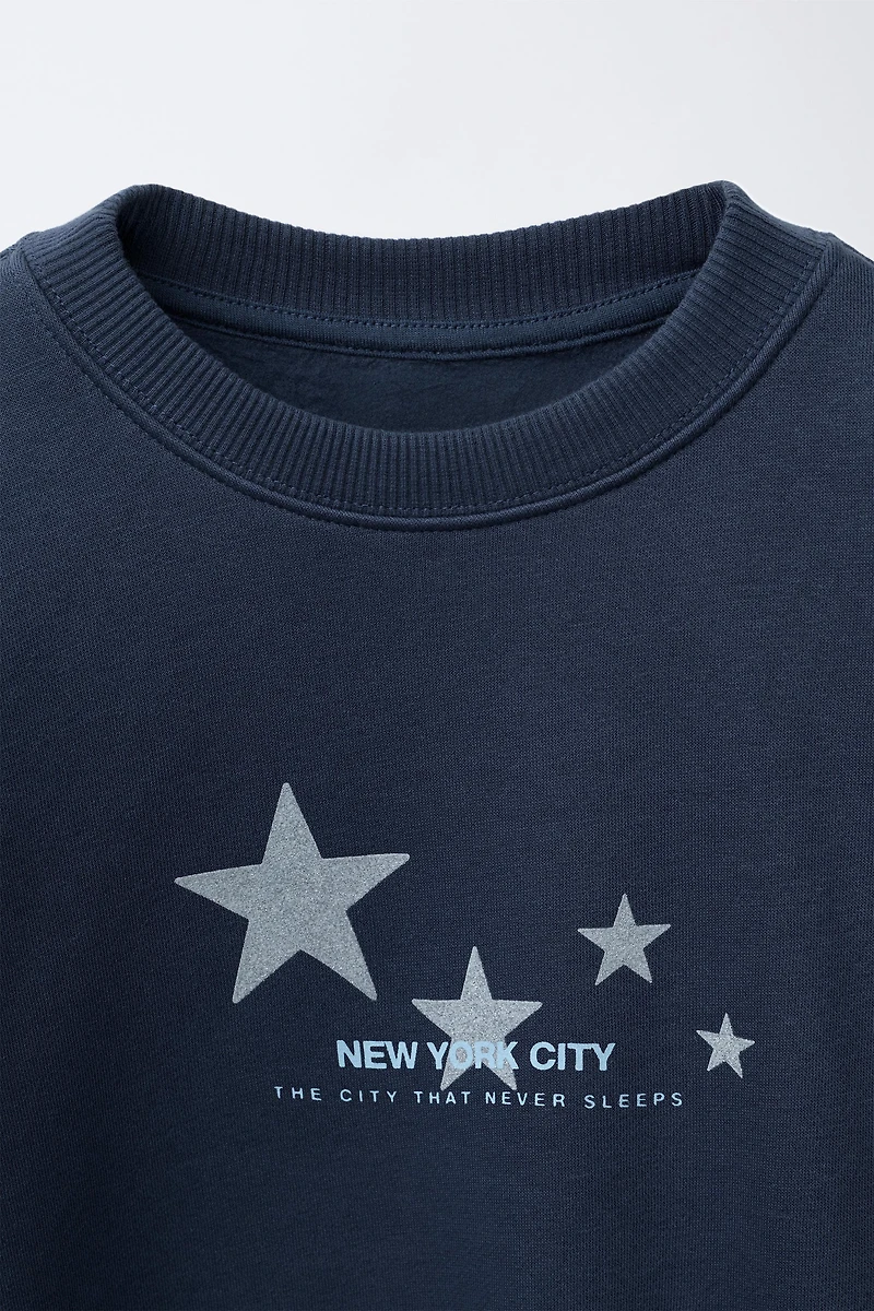 SPARKLY STAR PRINT SWEATSHIRT