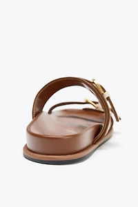 STRAPPY BUCKLE SANDALS