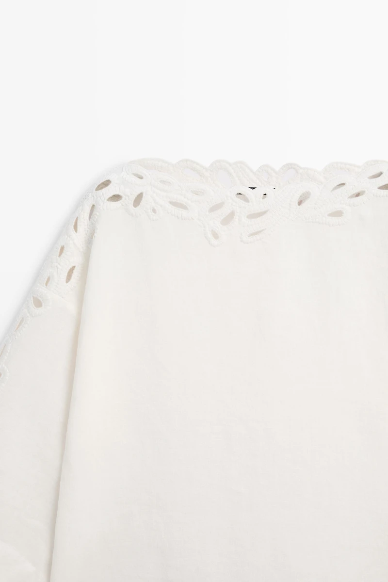 Linen boat neck blouse with embroidery