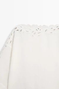 Linen boat neck blouse with embroidery