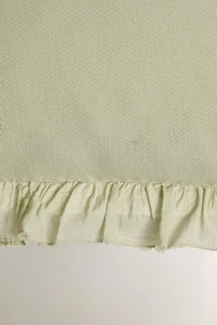 TEXTURED THROW PILLOW COVER WITH RUFFLE TRIM