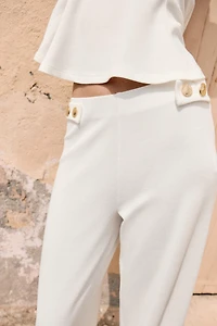 PANTALON DROIT EN PIQUÉ AVEC BOUTONS