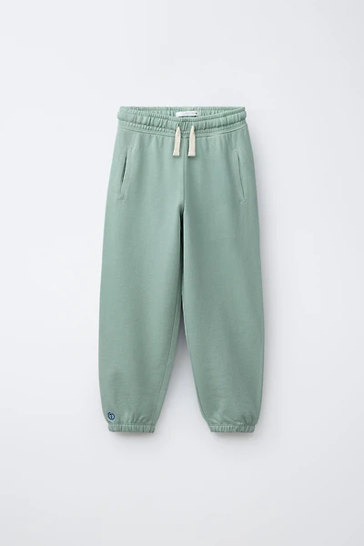 EMBROIDERED BALLOON PLUSH PANTS