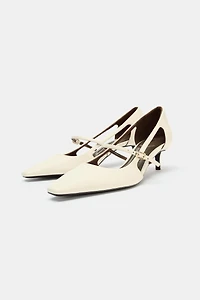 HEELS WITH SIDE CUT-OUTS