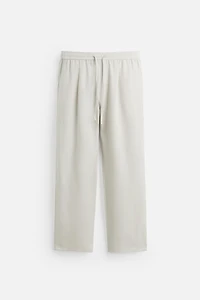 RELAXED FIT FLOWY PANTS