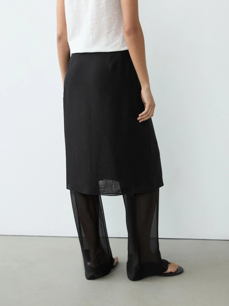 100% silk skirt over trousers
