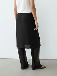 100% silk skirt over trousers